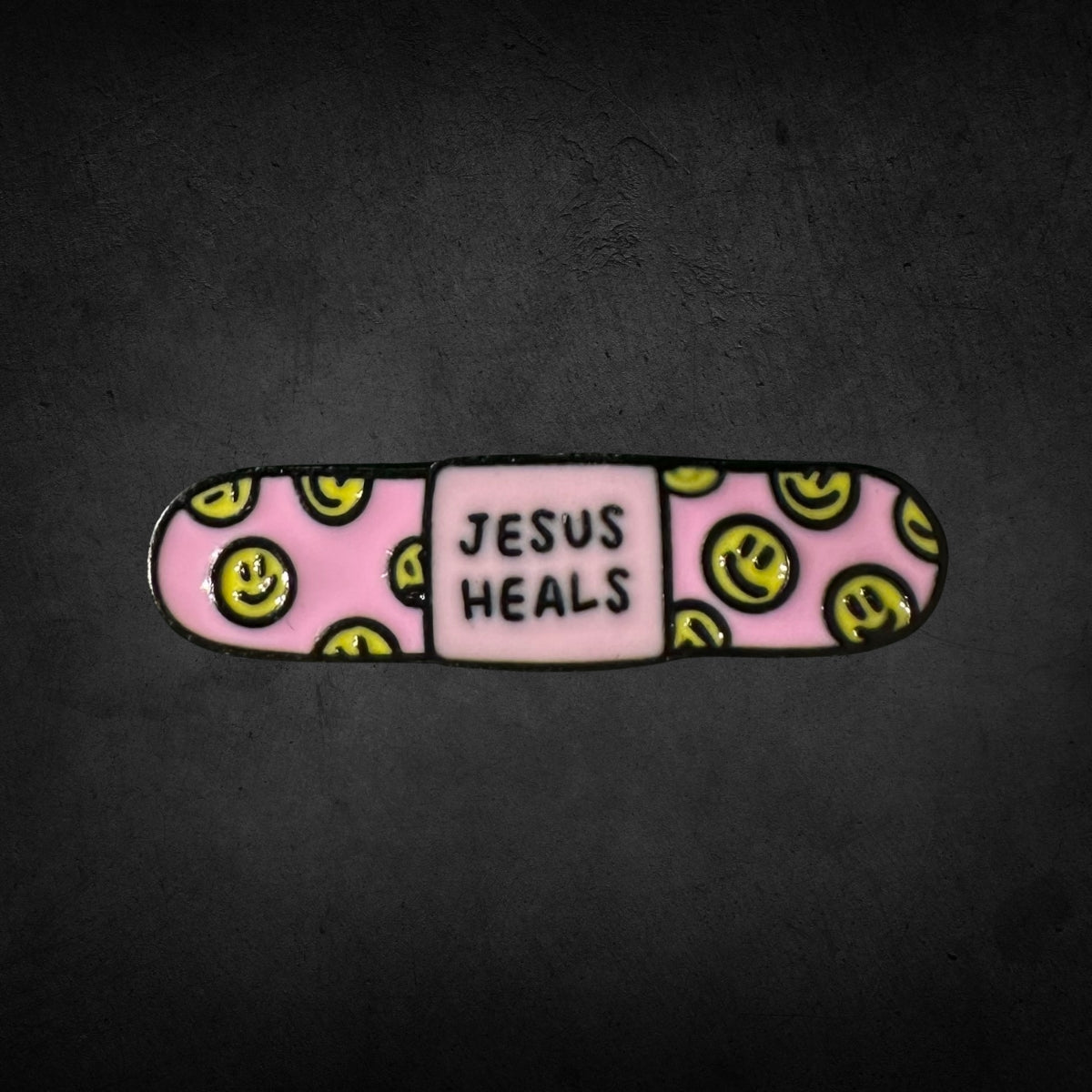 "Jesus Heals" Bandaid Lapel Pin